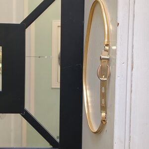 Vintage 70's gold serpentine skinny stretch belt.